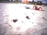 Sexy Sunbather Strips Naked on South Florida Sand