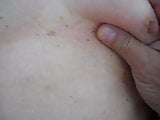 squeezing tit and rubbing clit