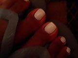 Closeup on Morenafeet fingers with French nail polish and Ha