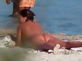 Uninterrupted naked on beach