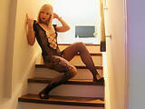 Teen Rudy poses in Fishnets on the Stairs BTS