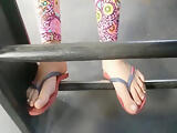 Teen girl feet on public bus