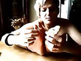 Angel Sniffs her Soles n Toes on a Table